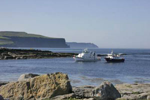 Doolin Ferries off Doolin Pier at low tide